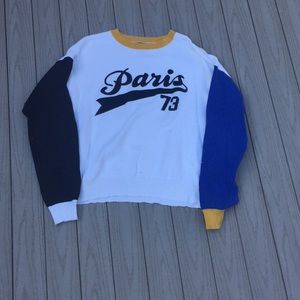 Multicolored sweater.